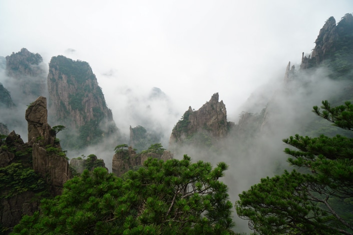 Mountain peaks covered in fog