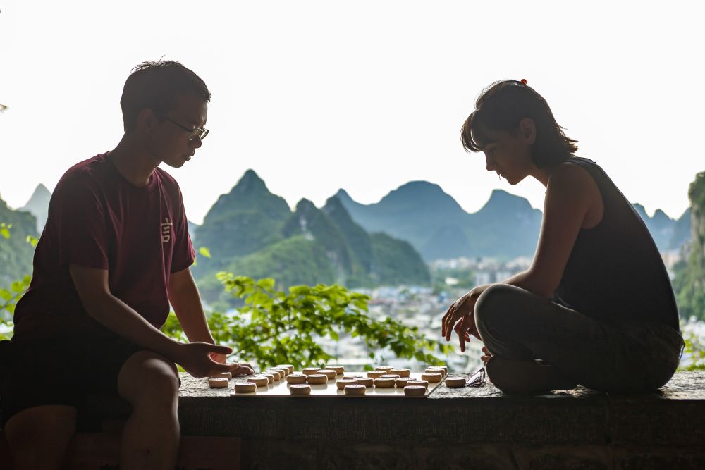 CLI Student and Teacher Playing Chess