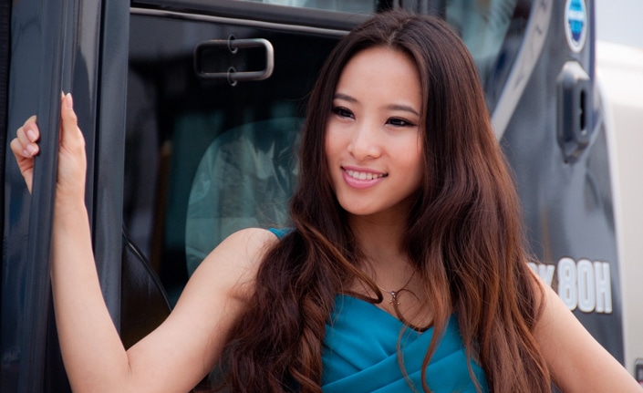 a photograph of a Chinese woman with a fox face, a face shape that's part of beauty standards in China