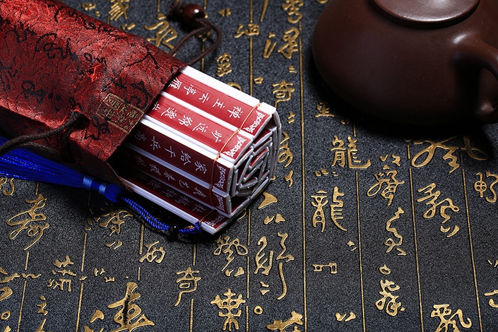Chinese characters carved on bamboo board