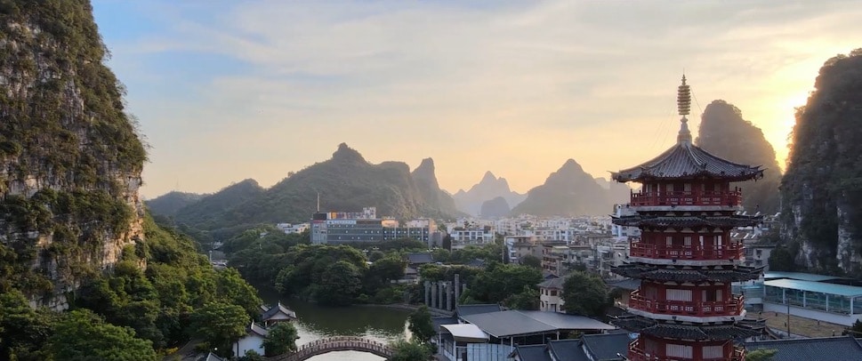 Guilin karst mountains, a lake, and a pagoda